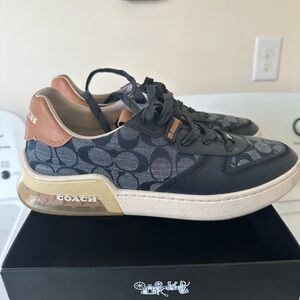 Coach lace up sneaker. Gently worn maybe 3/4 times. Multicolored